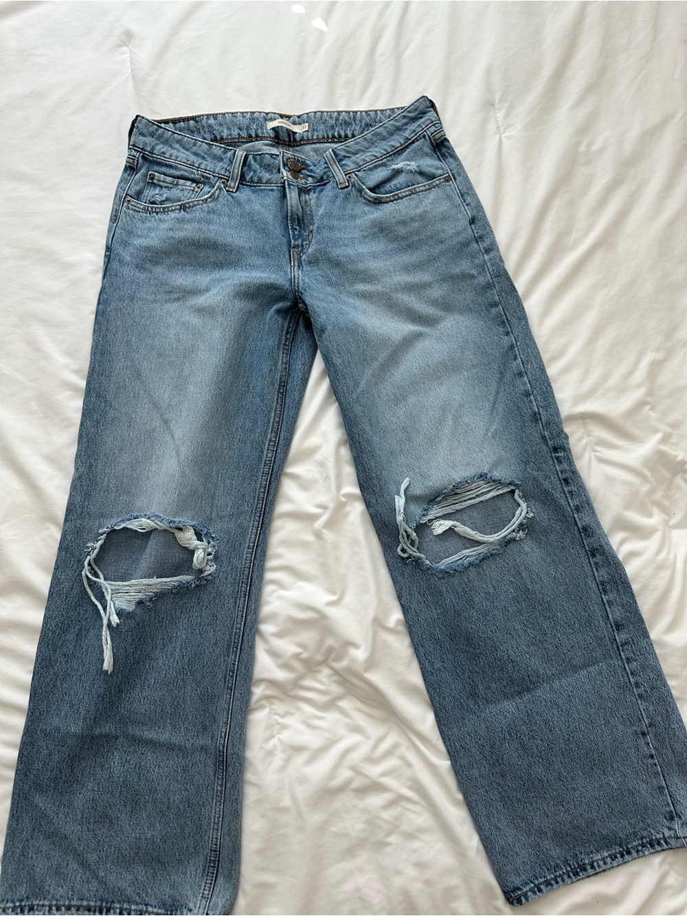 Levi's Light Blue Superlow Distressed Jeans